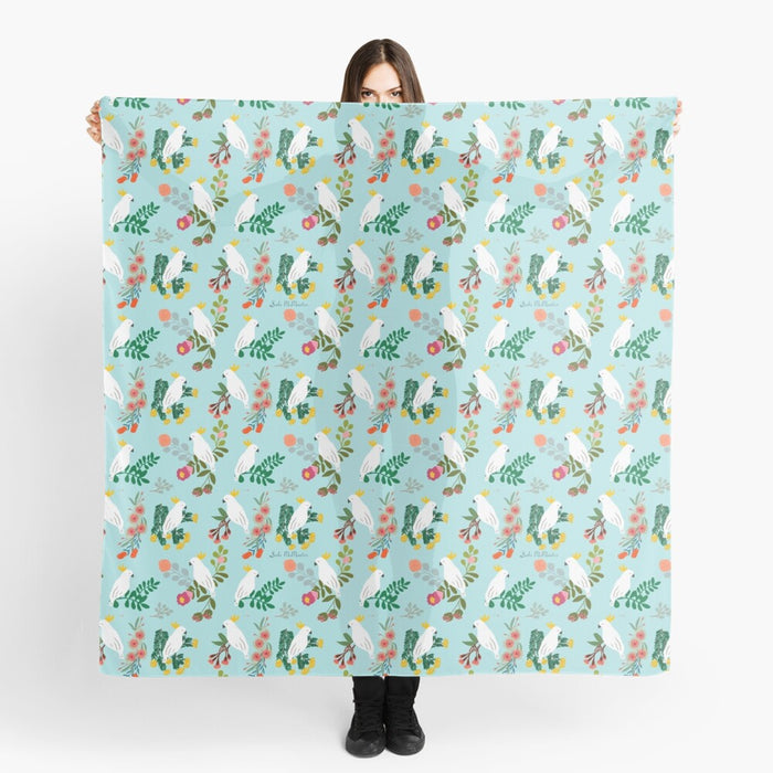 Large square scarf with Australian cockatoo art by Suki McMaster, soft drape, hand wash only.