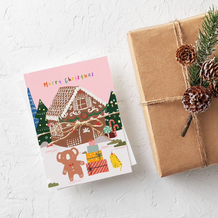 Christmas Ginger Bread House and Koala Greeting Card – Australian Animal Christmas Card by Suki McMaster